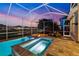 Relaxing pool and spa area with covered patio at 805 Islebay Dr, Apollo Beach, FL 33572