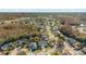 Aerial view of a neighborhood showcasing a house with a pool at 8436 Red Roe Dr, New Port Richey, FL 34653