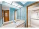 Bathroom with updated vanity and shower at 8436 Red Roe Dr, New Port Richey, FL 34653