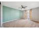 Bedroom with ceiling fan and window coverings at 8436 Red Roe Dr, New Port Richey, FL 34653