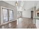 Bright dining room with hardwood floors and French doors at 8436 Red Roe Dr, New Port Richey, FL 34653