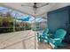 Relaxing pool area with patio furniture and screen enclosure at 8436 Red Roe Dr, New Port Richey, FL 34653