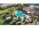 Community pool and spa with lake view at 10263 Gandy N Blvd # 107, St Petersburg, FL 33702