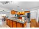 Spacious kitchen boasts granite countertops and wood cabinets at 1340 Williams Dr, Clearwater, FL 33764
