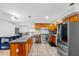 Kitchen with granite countertops, wood cabinets, and stainless steel appliances at 1340 Williams Dr, Clearwater, FL 33764