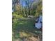 Overgrown backyard at 1608 S 45Th St, Tampa, FL 33619