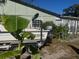 Mobile home with boat and ramp at 1608 S 45Th St, Tampa, FL 33619