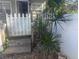 Front yard with white picket fence and potted plants at 1608 S 45Th St, Tampa, FL 33619