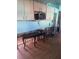 Damage to the kitchen shows the need for renovation, including the walls and countertops at 1608 S 45Th St, Tampa, FL 33619