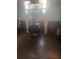 A wood burning stove is the focal point of this living room that needs renovations at 1608 S 45Th St, Tampa, FL 33619