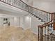 Open and airy entryway with a view to the dining area at 307 Harbor View Ln, Largo, FL 33770
