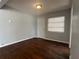 Simple bedroom with hardwood floors and gray walls at 450 47Th S St, St Petersburg, FL 33711