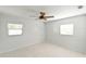 Bright bedroom with tile floors and ceiling fan at 5111 Eldorado Dr, Tampa, FL 33615