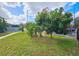 Spacious backyard with lush landscaping at 7211 Waycross Ave, Tampa, FL 33619