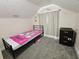 Small bedroom with twin bed, dresser, and whimsical wall decor at 7211 Waycross Ave, Tampa, FL 33619