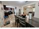 Dining area with dark wood table and chairs at 7211 Waycross Ave, Tampa, FL 33619