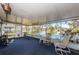 Spacious screened porch with lake view and seating at 7837 Tiburon Dr, Largo, FL 33773