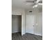 Bedroom with wood floors, a ceiling fan, closet access, and ample natural light at 9606 Seadale Ct # 101, Riverview, FL 33578