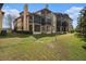 Exterior view of building with balconies and golf course view at 2400 Feather Sound Dr # 418, Clearwater, FL 33762