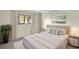 Bright bedroom with a queen-size bed and window views at 2679 Sabal Springs Cir # 203, Clearwater, FL 33761