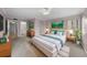 Spacious bedroom with a king-size bed and ensuite bathroom at 2679 Sabal Springs Cir # 203, Clearwater, FL 33761