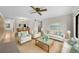 Bright living room with comfy sofas, coffee table, and large windows at 2679 Sabal Springs Cir # 203, Clearwater, FL 33761