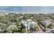 Aerial view of condo building with water views at 2699 Seville Blvd # 403, Clearwater, FL 33764
