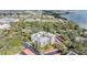 Condo building aerial view, showcasing lush landscaping at 2699 Seville Blvd # 403, Clearwater, FL 33764