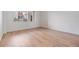 Bright bedroom with light wood flooring at 2699 Seville Blvd # 403, Clearwater, FL 33764