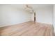 Spacious bedroom with wood flooring and access to bathroom at 2699 Seville Blvd # 403, Clearwater, FL 33764