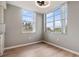 Bright dining area with wood flooring and large windows at 2699 Seville Blvd # 403, Clearwater, FL 33764