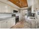 Modern kitchen with granite countertops, stainless steel appliances, and light wood cabinets at 2699 Seville Blvd # 403, Clearwater, FL 33764