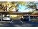 Covered parking area with ample parking spots at 2699 Seville Blvd # 403, Clearwater, FL 33764