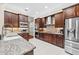 Modern kitchen with stainless steel appliances and granite countertops at 31072 Chesapeake Bay Dr, Wesley Chapel, FL 33543