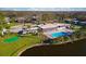 Aerial view of community, pool and green space at 3932 Ashwood Ln # 42, Sarasota, FL 34232