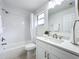 Clean bathroom, white vanity, and bathtub at 3932 Ashwood Ln # 42, Sarasota, FL 34232