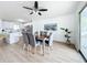 Open dining area with sliding doors to patio access at 3932 Ashwood Ln # 42, Sarasota, FL 34232