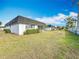 Exterior view of the home and surrounding landscape at 3932 Ashwood Ln # 42, Sarasota, FL 34232