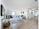 Bright living room with hardwood floors, comfy seating, and stylish decor at 3932 Ashwood Ln # 42, Sarasota, FL 34232