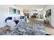 Spacious living room with dining area view, offering a bright and airy atmosphere at 3932 Ashwood Ln # 42, Sarasota, FL 34232