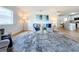 Living room with kitchen view, featuring modern finishes and an open floor plan at 3932 Ashwood Ln # 42, Sarasota, FL 34232