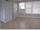 Bright bedroom with tile floors and ample closet space at 5610 / 5612 18Th S Ave, Gulfport, FL 33707