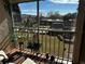 Relaxing balcony view overlooking the community pool and lush landscaping at 8765 Bardmoor Blvd # 308, Seminole, FL 33777