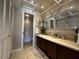 Bathroom with vanity, mirror and tub shower combo at 8765 Bardmoor Blvd # 308, Seminole, FL 33777