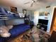Cozy bedroom with a bunk bed, TV, and ample floor space at 8765 Bardmoor Blvd # 308, Seminole, FL 33777