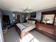 Main bedroom with dresser and a cozy bed at 8765 Bardmoor Blvd # 308, Seminole, FL 33777