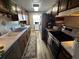 Well-equipped kitchen featuring stainless steel appliances and ample cabinetry at 8765 Bardmoor Blvd # 308, Seminole, FL 33777
