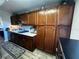 Well-equipped kitchen with ample wood cabinetry at 8765 Bardmoor Blvd # 308, Seminole, FL 33777