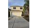 Two-story house with attached garage and driveway at 12954 Fennway Ridge Dr, Riverview, FL 33579