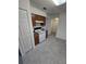 Kitchen with wood cabinets and white appliances at 12954 Fennway Ridge Dr, Riverview, FL 33579